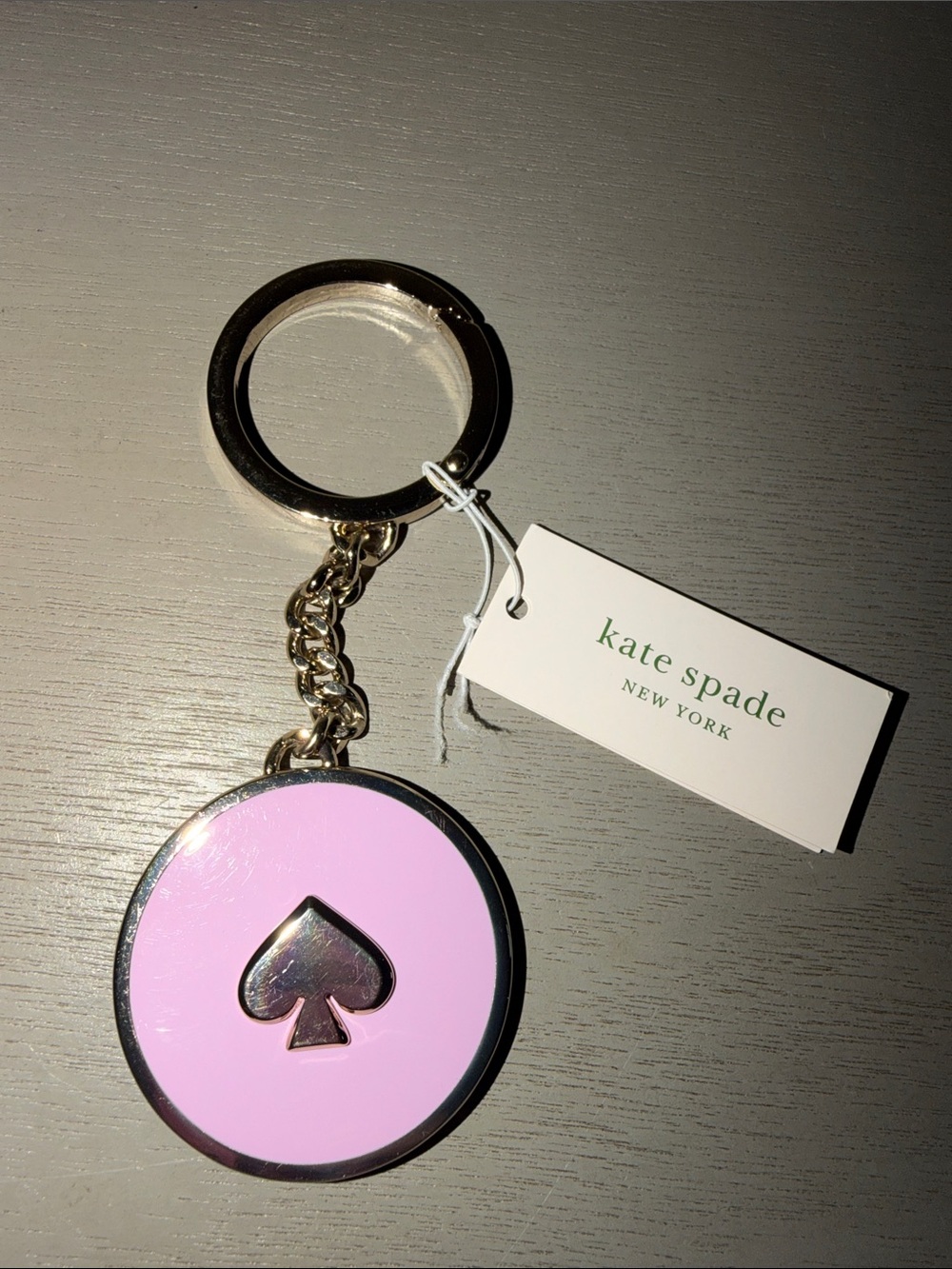kate spade pink and silver spade circle keyring